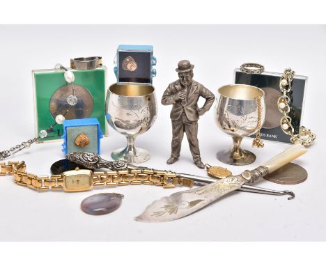 A BAG OF ASSORTED ITEMS, to include a titanium gents ring, with two moveable links, one set with a princess cut diamond, stam