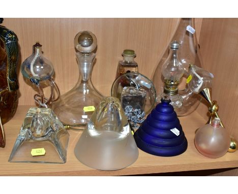 A SMALL COLLECTION OF GLASSWARE, including a decanter and stopper, the decanter with etched signature, a tall carafe with hol