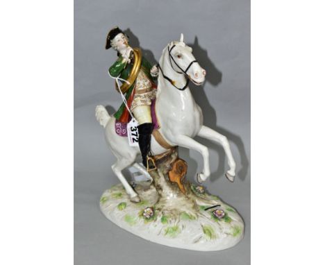 A LATE 19TH CENTURY CONTINENTAL PORCELAIN FIGURE OF A LATE 18TH CENTURY MAN WITH A HORN ON HORSEBACK, the grey stallion reari