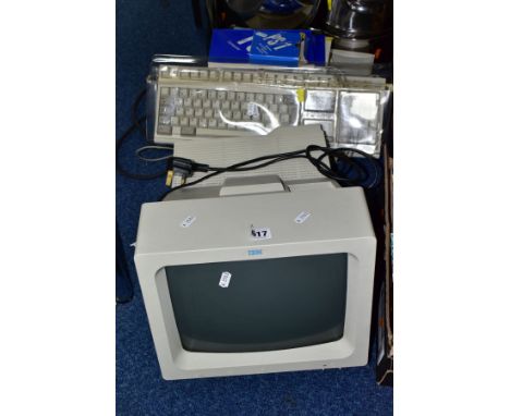 A VINTAGE IBM PS/1 TYPE 2011 PERSONAL COMPUTER with Dos 3.30 diskettes, monitor, keyboard, mouse, manual, cables and Microsof