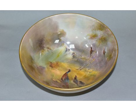 A ROYAL WORCESTER FOOTED BOWL PAINTED BY JAMES STINTON, the interior with a scene of cock and hen pheasants by a waterfall, s