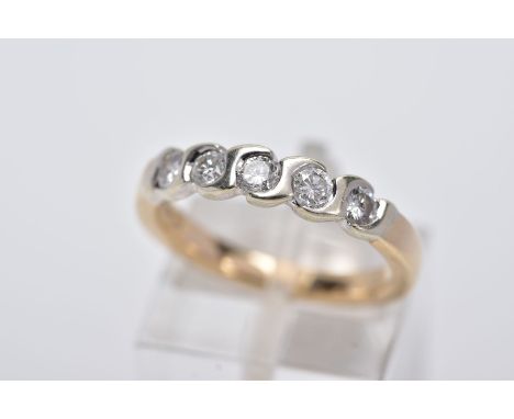 A 9CT GOLD FIVE STONE DIAMOND RING, designed with a row of round brilliant cut diamonds, each within a cross over setting, st