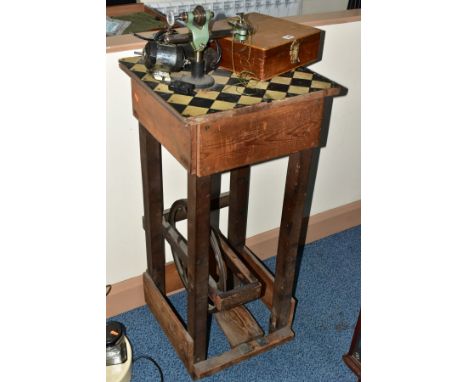 A WATCH MAKERS TREADLE LATHE, attached is a 'Pultra Manchester' watch makers lathe with additional tools and its original fit