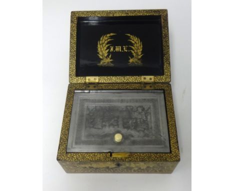 A Chinese lacquer and gilt decorated Tea Caddy with pewter insert 19th Century