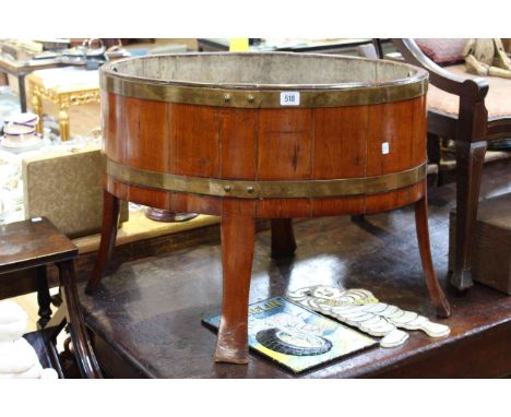 Oval teak brass bound planter/wine cooler