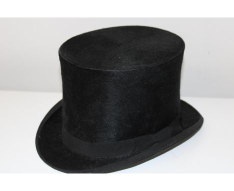 A vintage child's top hat 