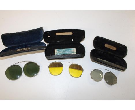 Three pairs of vintage cased spectacles 