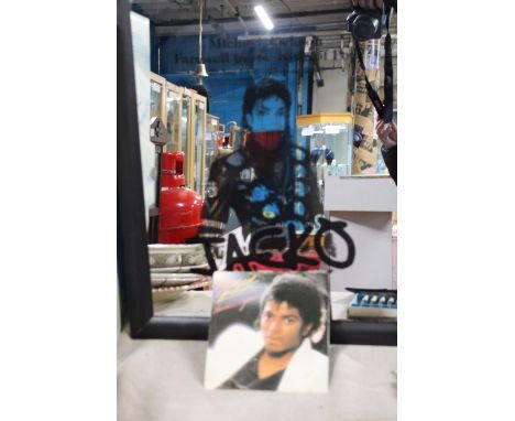 A Michael Jackson Mirror &amp; single. 58cm x 48cm 