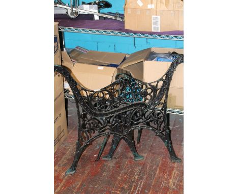 A pair of wrought iron bench ends collection only 