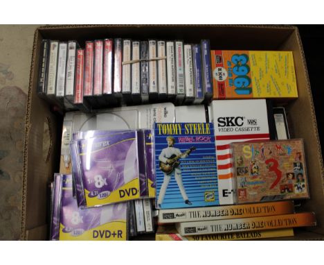 A box full of vintage audio &amp; video tapes etc 