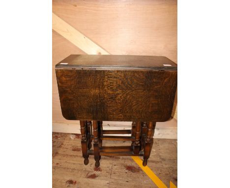 A vintage drop leaf table 74 cm x 61cm x 30cm when folded. collection only 