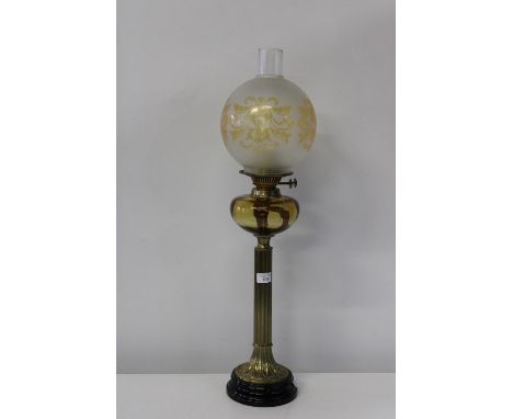 A vintage brass &amp; glass table oil lamp 75cm tall. (slight crack to the base of the glass shade.. collection only 