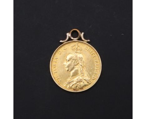 A Queen Victoria Two Pound, Jubilee bust l, reverse George and the Dragon, dated 1887. With attached loop for suspension. 16.