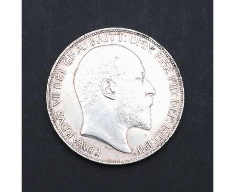An Edward VII Crown, bare head r. reverse George and the Dragon, dated 1902. With old collectors ticket   *Condition:  A coup