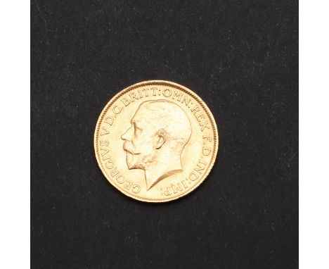 A George V Sovereign, bare head portrait l. George and the Dragon reverse, dated 1915   *Condition:  Light surface marks.