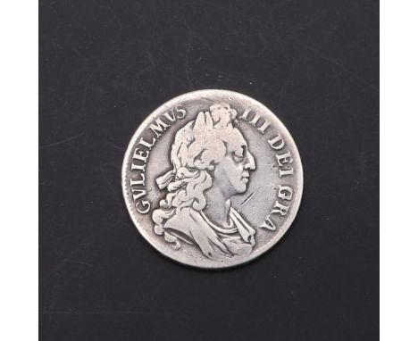 A William III Crown, first draped bust r. reverse with cruciform shields and first harp, dated 1696, regnal year to the rim '