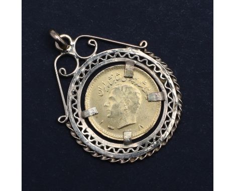 A Quarter Pahlavi Iranian gold coin, bare head portrait l. reverse with sword carrying lion before a rising sun. In an unmark