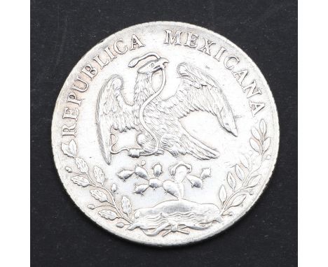 A Mexican silver 8 Reales coin with Liberty reverse, dated 1894, mint mark CA for the Chihuahua Mint. '8R. CA 1894. M. M. 10D