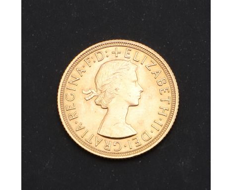 An Elizabeth II Sovereign dated 1963, St George and the Dragon reverse   *Condition:  Light surface marks.