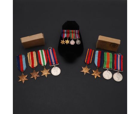 A Second World War Group of four comprising 1939-45, Italy and Africa Stars and War Medal, unnamed as issued, in a postal box