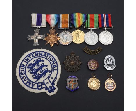 A group of six comprising Military Cross, unnamed as issued, 1914-15 Star named to 2520 Pte J. Crabtree L.N.Lan R. War Medal 