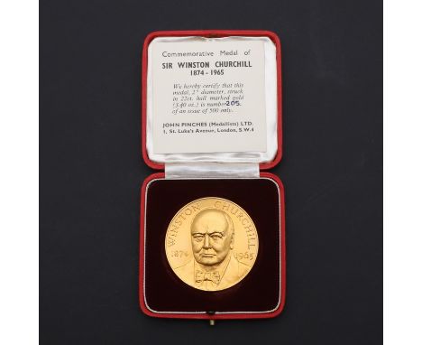 A Gold medal by L.E. Pinches for John Pinches, obverse portrait of Churchill 1874-1965, reverse elaborate coat of arms, hallm