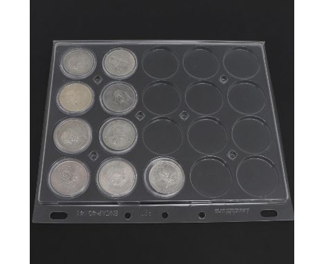 A collection of Mexican Silver Dollars: 1948, 1951, 1952, 1953 (2), 1968 (3), 1978, In capsules and Leuchtturm file page   *C