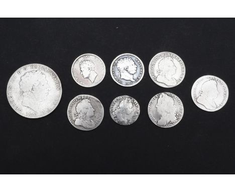 A small collection of silver coins: William III Sixpence 1697, B below the bust for the Bristol Mint. George I Shillings 1723