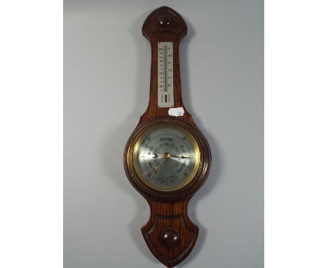 An Oak Aneroid Wall Barometer.