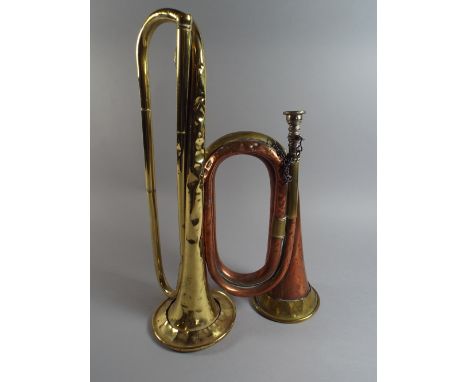 A Military Bugle by J Higham Ltd Manchester and A Brass Example by Potter of London. 