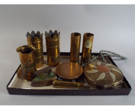 A Collection of Trench Art Shells, Flat Iron and Eastern Flask.