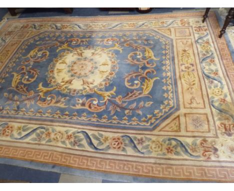 A Large Chinese Woolen Carpet Square on Blue Ground