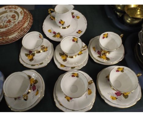 A Rose Patterned Tea Set.