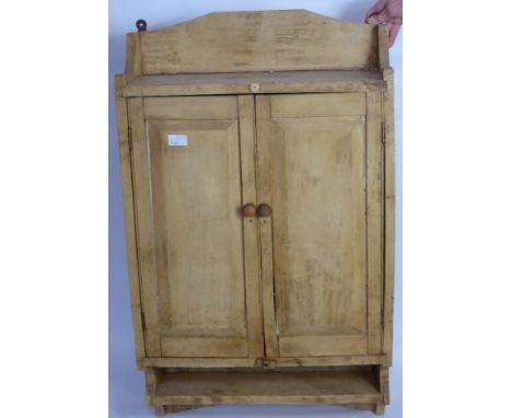 A Pine Kitchen Cupboard with shelf below, approx 55 x 90 x 20 cms.