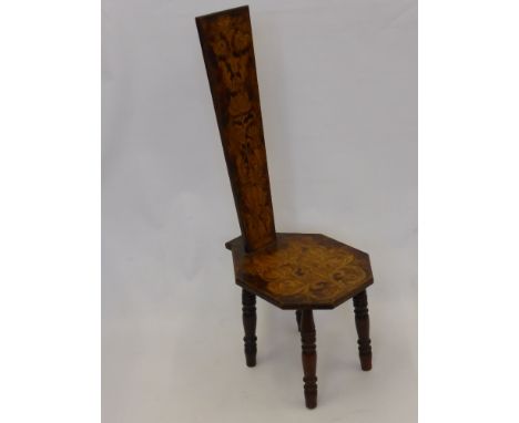 An Antique Oak Stick Back Chair, the chair having pen work design depicting flowers and fruit, on turned legs.