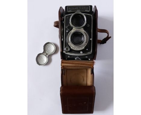 A Rolleicord Model V TLR Camera with original leather case and lens cap, serial no. 1557672 (1956) fitted with Schneider-Kreu