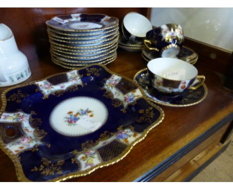 A Collection of Viennese Crockery, comprising two square dishes, twelve tea plates, six cups and six saucers. (26)