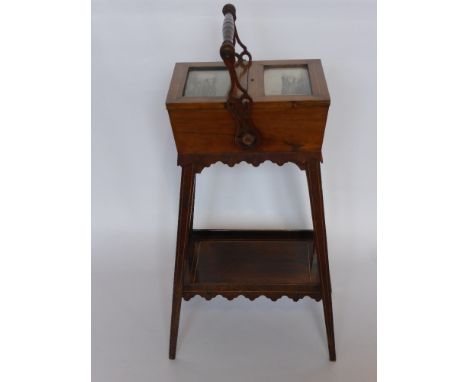 A 19th Century Rosewood Lady's Work Box, with box wood inlay, two glazed doors with fitted silk interior and decorative turne