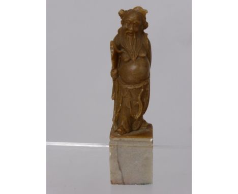 A Chinese Soap Stone Seal - the seal depicting a wise man.