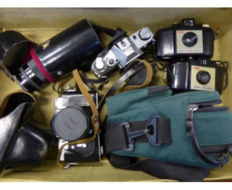 A Quantity of Cameras, including Kodak Brownie, two Cannon  AE1, Zenith and lens, together with a box of lenses and a flash.