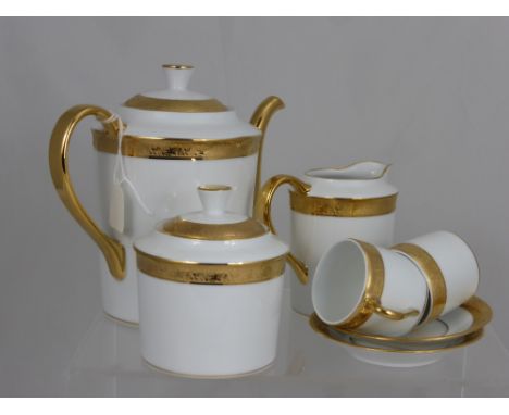 Limoges Tea Set, comprising Coffee Pot, sugar bowl, creamer, six cups and saucers.