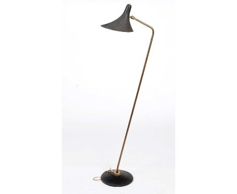 Attributed to Giuseppe Ostuni: a floor lamp with shaped black metal shade, brass stem and metal base.