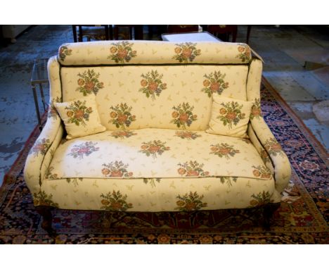 SOFA, Victorian mahogany and gilt heightened with cream and rose patterned upholstery, 125cm W.
