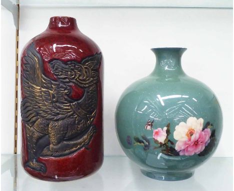 CHINESE VASES, a set of two, one ceramic vase with chrysanthemum decoration and the other bottle vase with dragon detail, tal