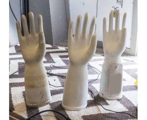 MID 20TH CENTURY SPANISH FACTORY RUBBER GLOVE MOULD BLOCKS, a set of three, vintage bisque porcelain, 44cm H. (3)
