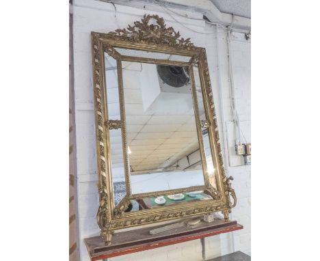 WALL MIRROR, 19th century French giltwood and gesso moulded rectangular bevelled with cushion marginal plates, 101cm W x 165c