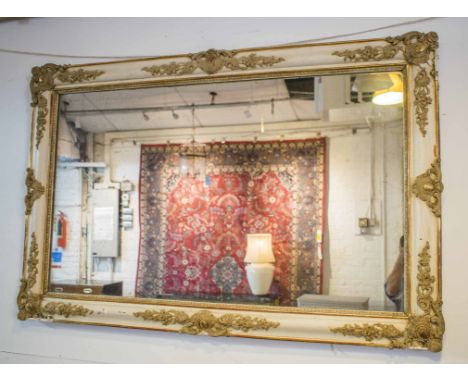 WALL MIRROR, mid 19th century French painted and giltwood with scroll and flowerhead decoration, 85cm W x 131cm H. (with faul