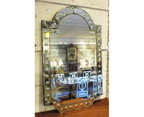 WALL MIRROR, Venetian style with an arched top and a bevelled plate having a bubble effect border, 75cm W x 122cm H.