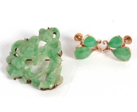A pair of jade earrings and brooch, the earrings set with two pear shape jade cabochons with screwback fittings stamped 9ct, 