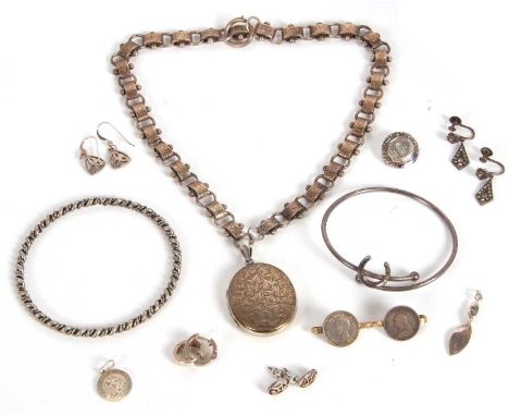 A mixed lot of jewellery to include a Victorian chain (tests as silver) and an oval locket, a horseshoe open ended bangle, si